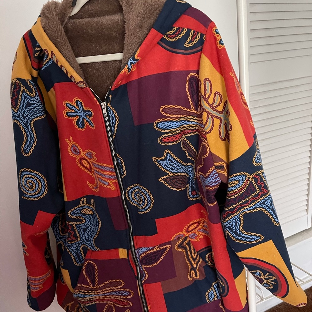 Eclectic car coat length jacket for cool weather.